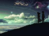 情侣站在山坡夏日吹风浪漫图片