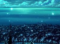 海边都市夜景璀璨图片