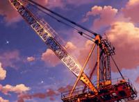 夕阳下高耸的吊塔图片