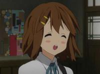 图片上的人物应该是轻音少女里的平泽唯